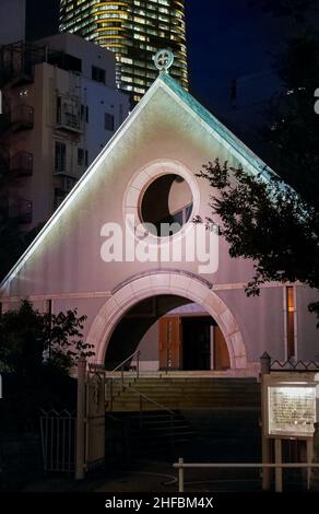 The view of the St. Andrews Cathedral church of the Tokyo Diocese of the Anglican Church at night. Tokyo Stock Photo