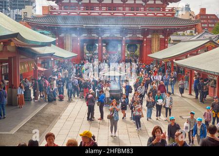 Tokyo, Japan - October 24, 2019: The territory of the oldest Buddhist temple Sensoji always full of people. The view from the main hall. Asakusa. Toky Stock Photo