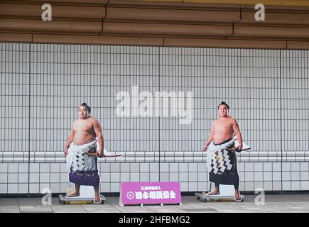 Tokyo, Japan - October 24, 2019: The figures of the 69th Yokozuna Hakuho and the 71th Yokozuna Kakuryu at the photo zone in front of Ryogoku Kokugikan Stock Photo