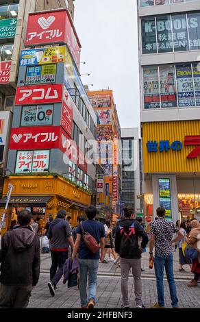 Tokyo, Japan - October 26, 2019: The view of Akihabara buzy street surrounded by the many manga, anime and electronic shops icons. Chiyoda ward. Tokyo Stock Photo