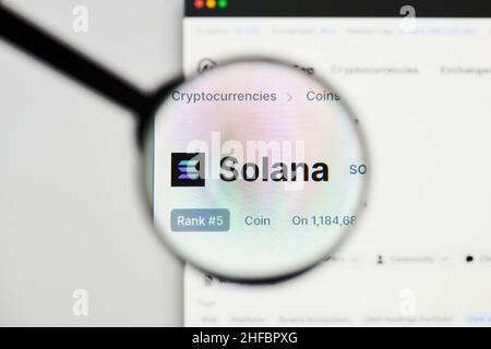 Milan, Italy - January 11, 2022: solana - SOL website's hp.  solana, SOL coin logo visible through a loope. Defi, ntf, cryptocurrency concepts illustr Stock Photo