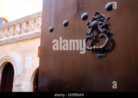 Wooden gates with knocker Stock Photo