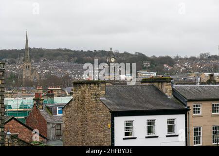 Lancaster, UK - 4th January 2020: Lancaster City centre sky line from a birds eye top view. Small village background with cobbled houses Stock Photo