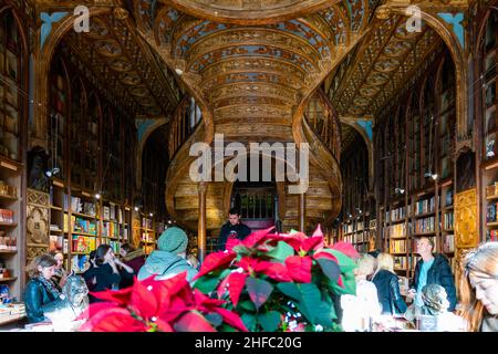Porto, Portugal - 18 November 2019: Inside the famous Lello Bookstore. Popular tourist destination, considered one of the most beautiful in Europe, sa Stock Photo