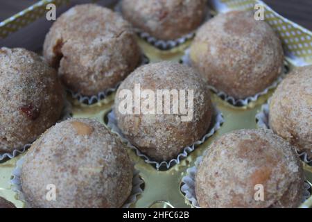 Delicious atta laddoo inside a box closeup Stock Photo