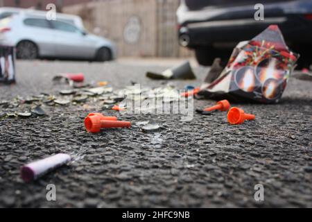plastic trash and broken glass on the street after New Year celebrations in Germany Stock Photo