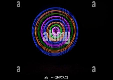 Multicolored circles on a black background Stock Photo