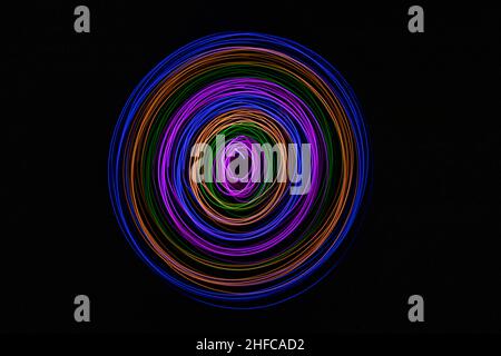 Multicolored circles on a black background Stock Photo