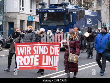 Frankfurt, Germany. 15th Jan, 2022. 15 January 2022, Hessen, Frankfurt/Main: Opponents of the current Corona measures demonstrate in downtown Frankfurt am Main. Thereby, a banner reads 'We are the red line'. The police accompanied the action with a massive force. Photo: Boris Roessler/dpa Credit: dpa picture alliance/Alamy Live News Stock Photo