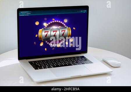 Slot machine online. Virtual casino, gambling from home, on computer. Play to win. Stock Photo