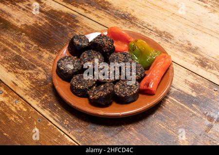 Rice blood sausage is a type of blood sausage that contains rice inside. It is traditionally made in the slaughter of the pig using its blood and mixi Stock Photo