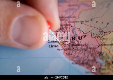 Peru pin on a world map. Peru travel destination planning pinned Stock Photo