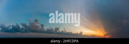 panorama of sky and sunset with gray clouds Stock Photo