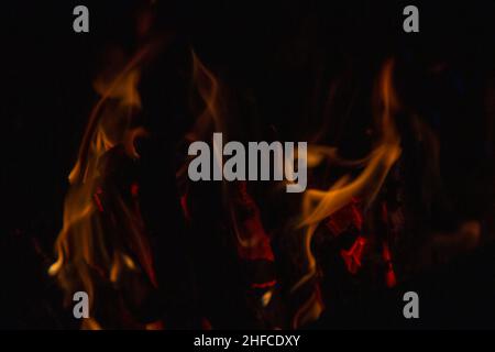 Heat heat energy close, red and yellow, heat energy at the fuel point at night lights on a black background Stock Photo