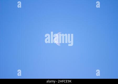 New moon in the blue sky. 05.02.2021 Stock Photo