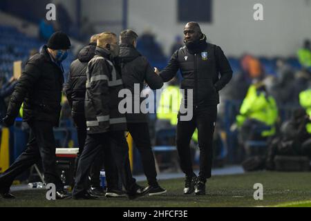 Sheffield, UK. 15th Jan, 2022. Darren Moore manager of Sheffield Wednesday shakes hands with Steven Schumacher manager of Plymouth Argyle at the end of the game in Sheffield, United Kingdom on 1/15/2022. (Photo by Simon Whitehead/News Images/Sipa USA) Credit: Sipa USA/Alamy Live News Stock Photo