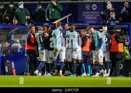 LONDON, UK. JAN 15TH QPR players & staff celebrate Charlie Austins goal during the Sky Bet Championship match between Queens Park Rangers and West Bromwich Albion at the Kiyan Prince Foundation Stadium., London on Saturday 15th January 2022. (Credit: Ian Randall | MI News) Credit: MI News & Sport /Alamy Live News Stock Photo