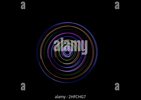 Multicolored circles on a black background Stock Photo