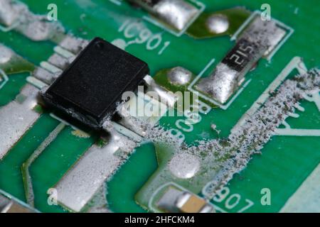 Damaged printed circuit board (PCB). Stock Photo