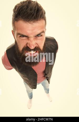 Extremely mad. Man aggressive face expression stand white background. Stressful day. Stressful male life. Aggressive mad man shout. Aggression causes Stock Photo