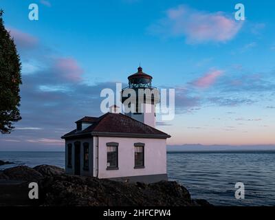 WA21121-00...WASHINGTON - Lime Kiln Lighthouse located on the shores of Haro Strait and popular whale watching area on San Juan Island. Stock Photo