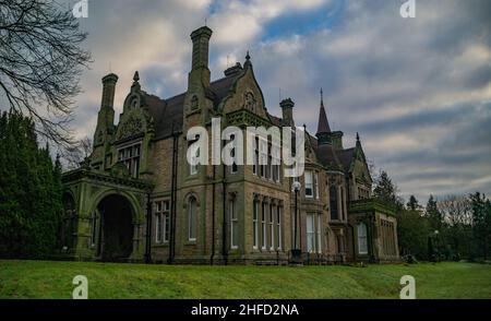 Denzell House, nestled in the beautiful surroundings of the Denzell Gardens (Devisdale) on an early winter morning with blue sky. Stock Photo