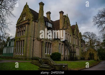 Denzell House, nestled in the beautiful surroundings of the Denzell Gardens (Devisdale) on an early winter morning with blue sky. Stock Photo