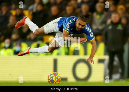 15th January 2022: Carrow Road, Norwich, Norforlk, England; Premier League football, Norwich versus Everton; Dominic Calvert-Lewin of Everton goes down after being fouled by Max Aaron of Norwich City Stock Photo