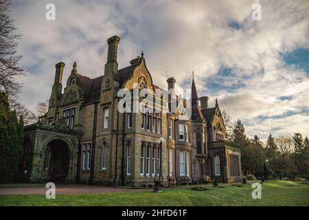 Denzell House, nestled in the beautiful surroundings of the Denzell Gardens (Devisdale) on an early winter morning with blue sky. Stock Photo