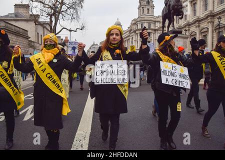 London, UK 15th January 2022. Kill The Bill protesters hold hands in Whitehall. Thousands of people marched through central London in protest against the Police, Crime, Sentencing and Courts Bill, which will make many types of protest illegal. Credit: Vuk Valcic / Alamy Live News Stock Photo