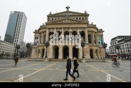 Frankfurt, Germany. 15th Jan, 2022. Pedestrians are seen in front of the Alte Oper in Frankfurt, Germany, Jan. 15, 2022. Germany's gross domestic product (GDP) rose by 2.7 percent in 2021 compared with the previous year but was down 2.0 percent from the pre-COVID-19 crisis year 2019, the Federal Statistical Office (Destatis) said on Friday. Credit: Lu Yang/Xinhua/Alamy Live News Stock Photo