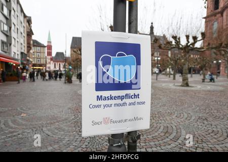 Frankfurt, Germany. 15th Jan, 2022. A sign reminding people to wear face masks is seen in Frankfurt, Germany, on Jan. 15, 2022. Germany's gross domestic product (GDP) rose by 2.7 percent in 2021 compared with the previous year but was down 2.0 percent from the pre-COVID-19 crisis year 2019, the Federal Statistical Office (Destatis) said on Friday. Credit: Lu Yang/Xinhua/Alamy Live News Stock Photo