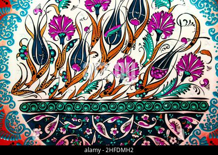 Traditional ottoman patterns on the porcelain surface. Traditional Turkish tile art called cini. Çini patterns. Çini art. Ottoman floral motifs. Stock Photo