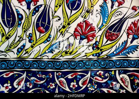 Traditional ottoman patterns on the porcelain surface. Traditional Turkish tile art called cini. Çini patterns. Çini art. Ottoman floral motifs. Stock Photo