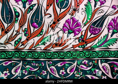 Traditional ottoman patterns on the porcelain surface. Traditional Turkish tile art called cini. Çini patterns. Çini art. Ottoman floral motifs. Stock Photo