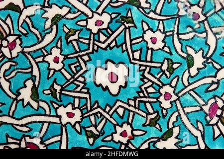 Traditional ottoman patterns on the porcelain surface. Traditional Turkish tile art called cini. Çini patterns. Çini art. Ottoman floral motifs. Stock Photo