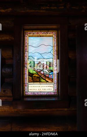 Moose, Wyoming, USA, May, 29, 2021: Stained glass window in the Chapel of Transfiguration - St. Johns Episcopal Church  in Grand Teton National Park, Stock Photo