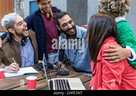 Group of five college students friends studying on campus at university yard  Stock Photo