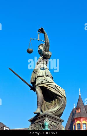 Statue of Lady Justice in front of the Romer in Frankfurt - Germany Stock Photo