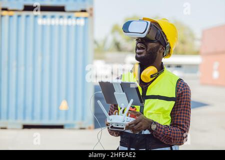 engineer staff worker using modern technology drone and VR headset for working Stock Photo