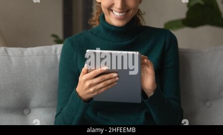 Close up young woman using digital computer tablet. Stock Photo