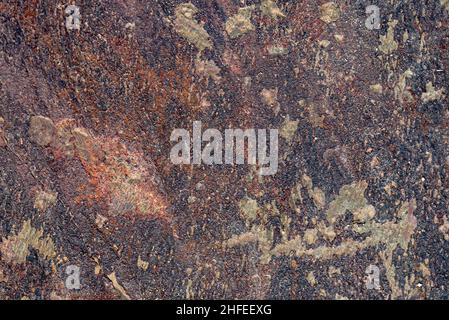 Gneiss the foliated banded metamorphic rock with gneissic texture Stock Photo