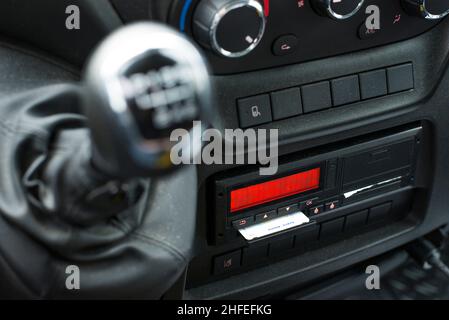 Digital tachograph in a van from an angle with ejected driver card Stock Photo