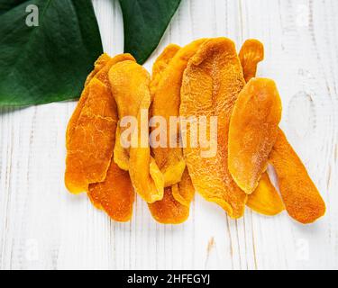 Dried Mango Fruit on Old Wooden Background Stock Photo