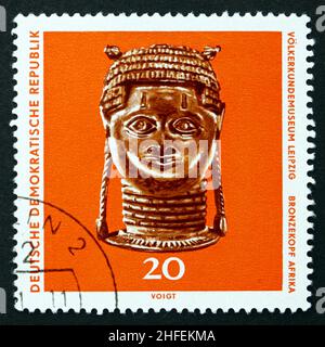GDR - CIRCA 1971: a stamp printed in GDR shows Bronze Head, Africa, Work from Ethnological Museum, Leipzig, circa 1971 Stock Photo