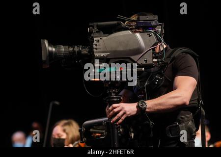 Bucharest, Romania - January 15, 2022: Professional steadicam (gimbal) operator filming a classical music concert. Stock Photo