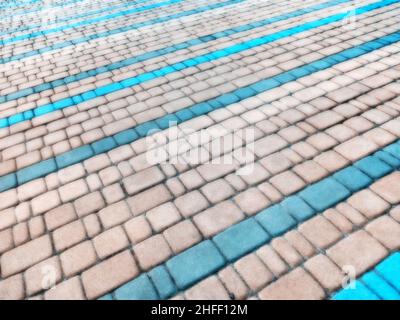 Abstract blurred background decorative paving slabs viewed at a slight angle Stock Photo