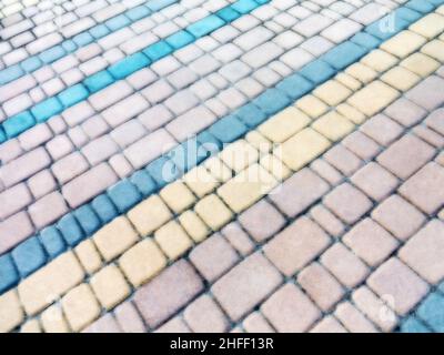 Abstract blurred background decorative paving slabs viewed at a slight angle Stock Photo
