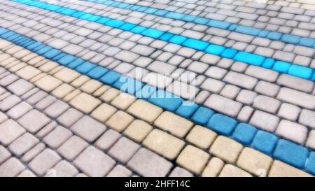 Abstract blurred background decorative paving slabs viewed at a slight angle Stock Photo
