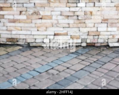 Abstract blurred background decorative paving slabs viewed at a slight angle Stock Photo
